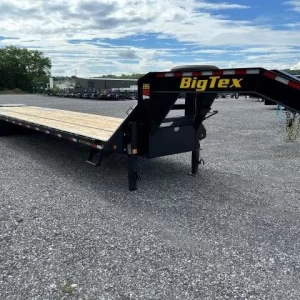 A large, black Big Tex 8.5x40 gooseneck deckover equipment trailer. The trailer features a flat, wide deck over the wheels, a gooseneck hitch, and heavy-duty mega ramps at the rear for loading equipment.