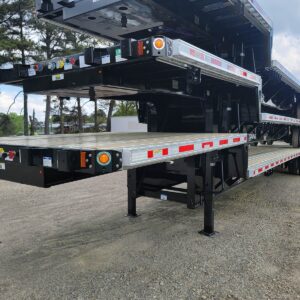 A new 2026 Fontaine 48-foot step deck trailer, a semi-trailer with two deck heights for hauling various types of freight. The trailer is shown in a clean, industrial setting, highlighting its steel or combination construction, gooseneck, and air ride suspension.
