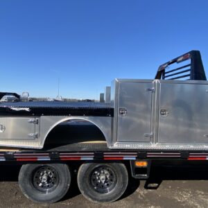 A Hillsboro Hybrid Truck Bed, model STA500, a flatbed style truck body with integrated features. The bed has a diamond plate floor, a gooseneck hitch ball, and is shown attached to a pickup truck. It has a mix of steel and aluminum components.